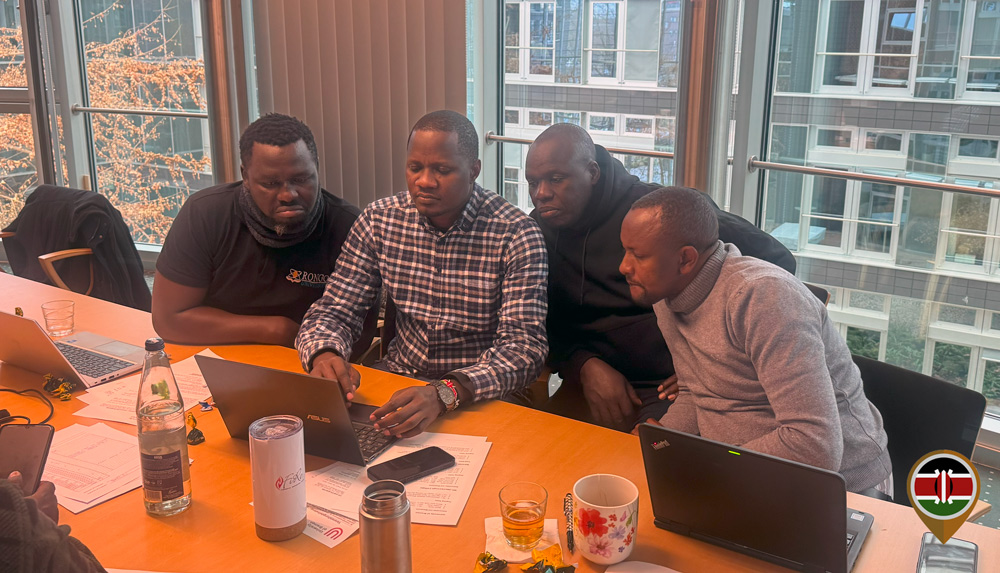 Kenyan team members work on an online activity